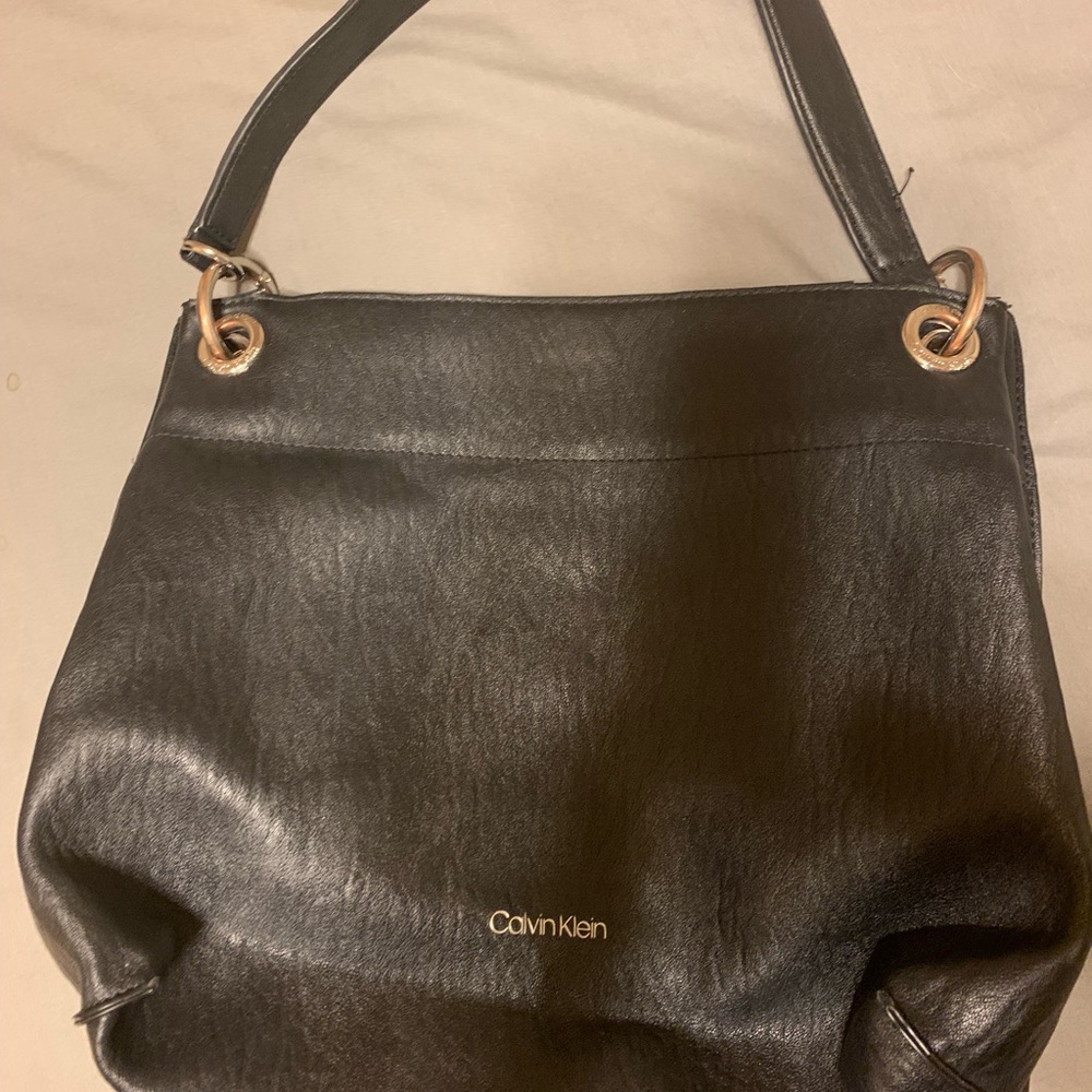 Black CALVIN KLEIN leather bag with torn inside black lining (needs to be sewn)